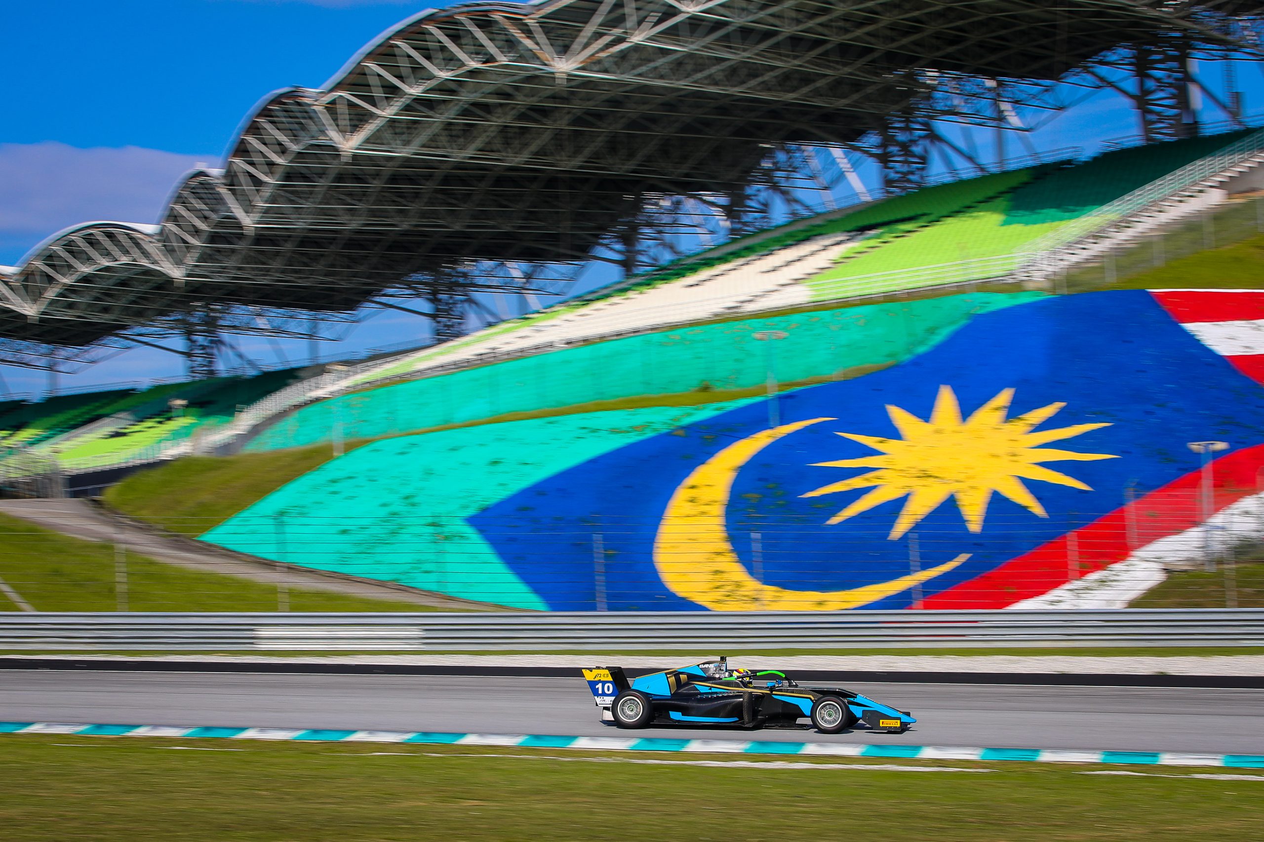 An Evans GP single-seater racing at Sepang International Circuit